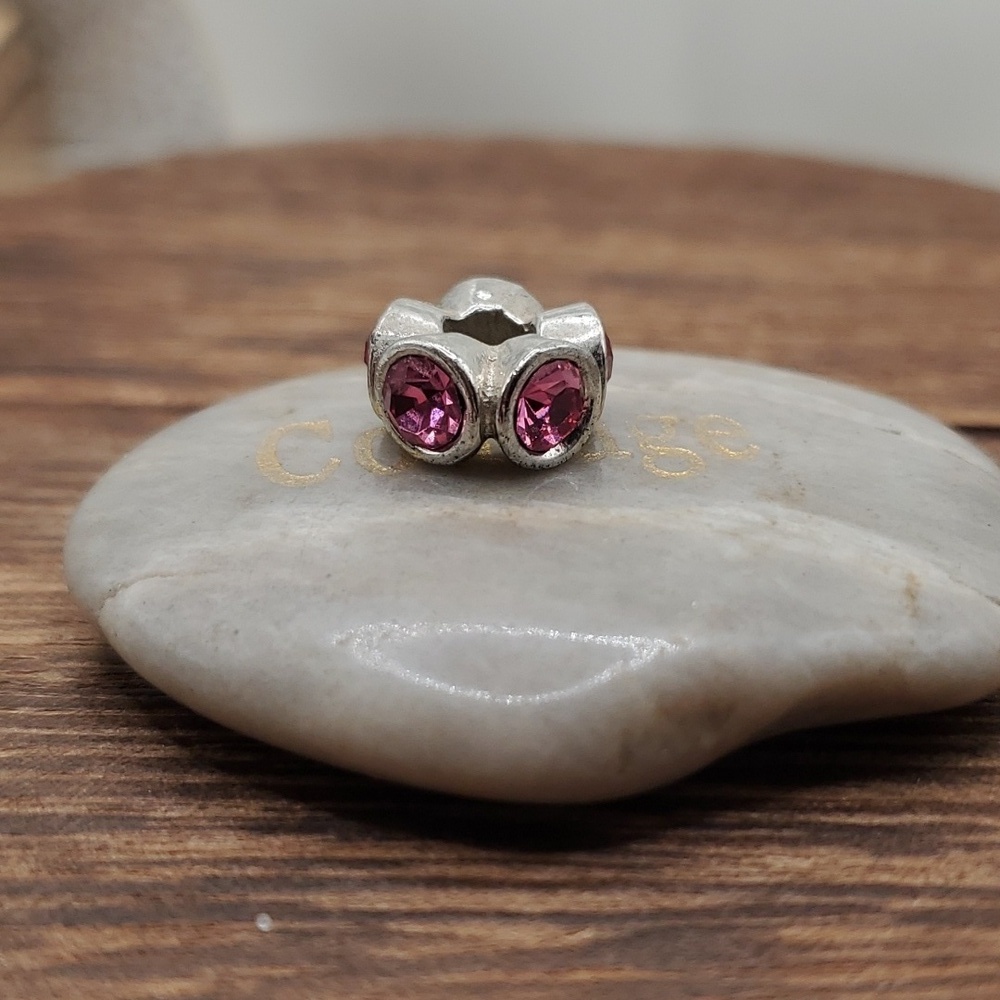 Pink crystal wheel charm‎